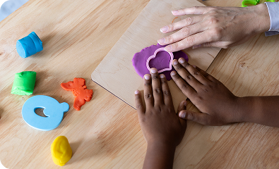 Hands-on ABA therapy session with a child