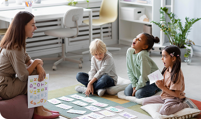 Three children participating in a group classroom activity
