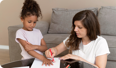 Behavior analyst conducting a developmental assessment with a child